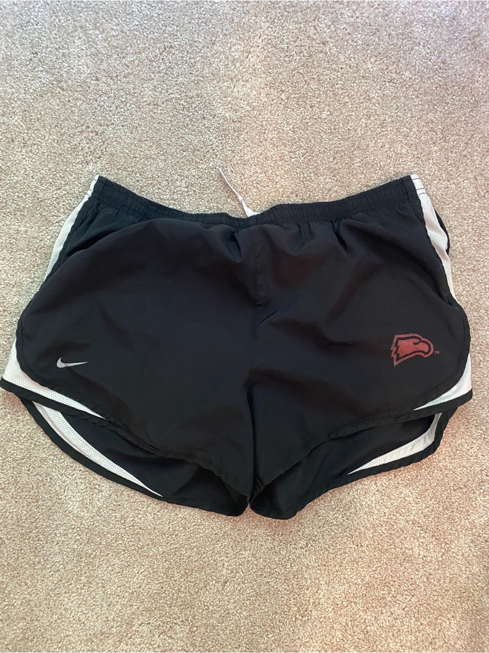Nike Black Women's Athletic Shorts with White Trim and Red Logo